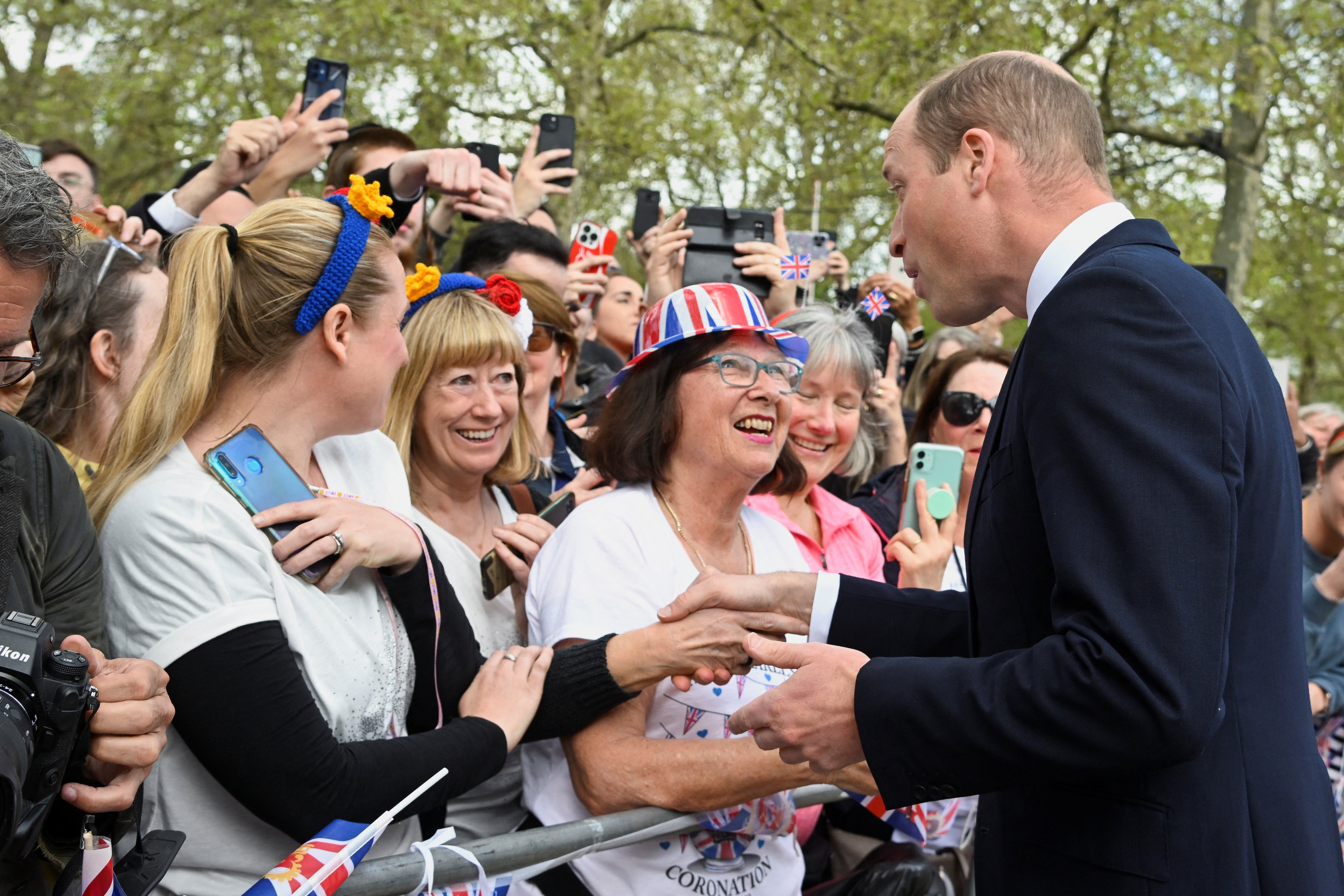 Prince William meets well-wishers on The Mall outside Buckingham Palace on Friday