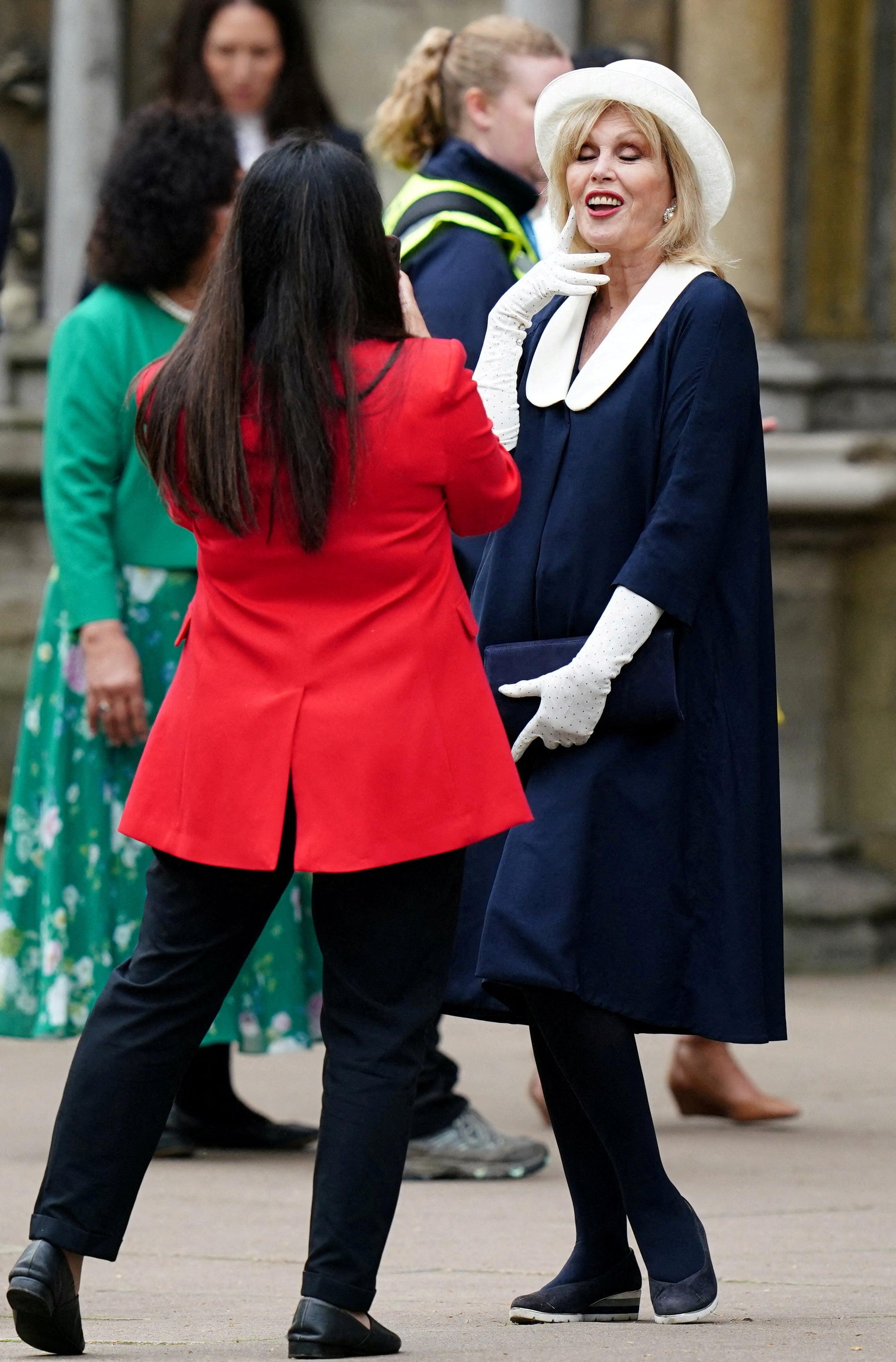 Lumley went for a navy blue and white outfit