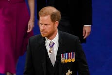 Lone Prince Harry arrives at Westminster Abbey for father’s coronation