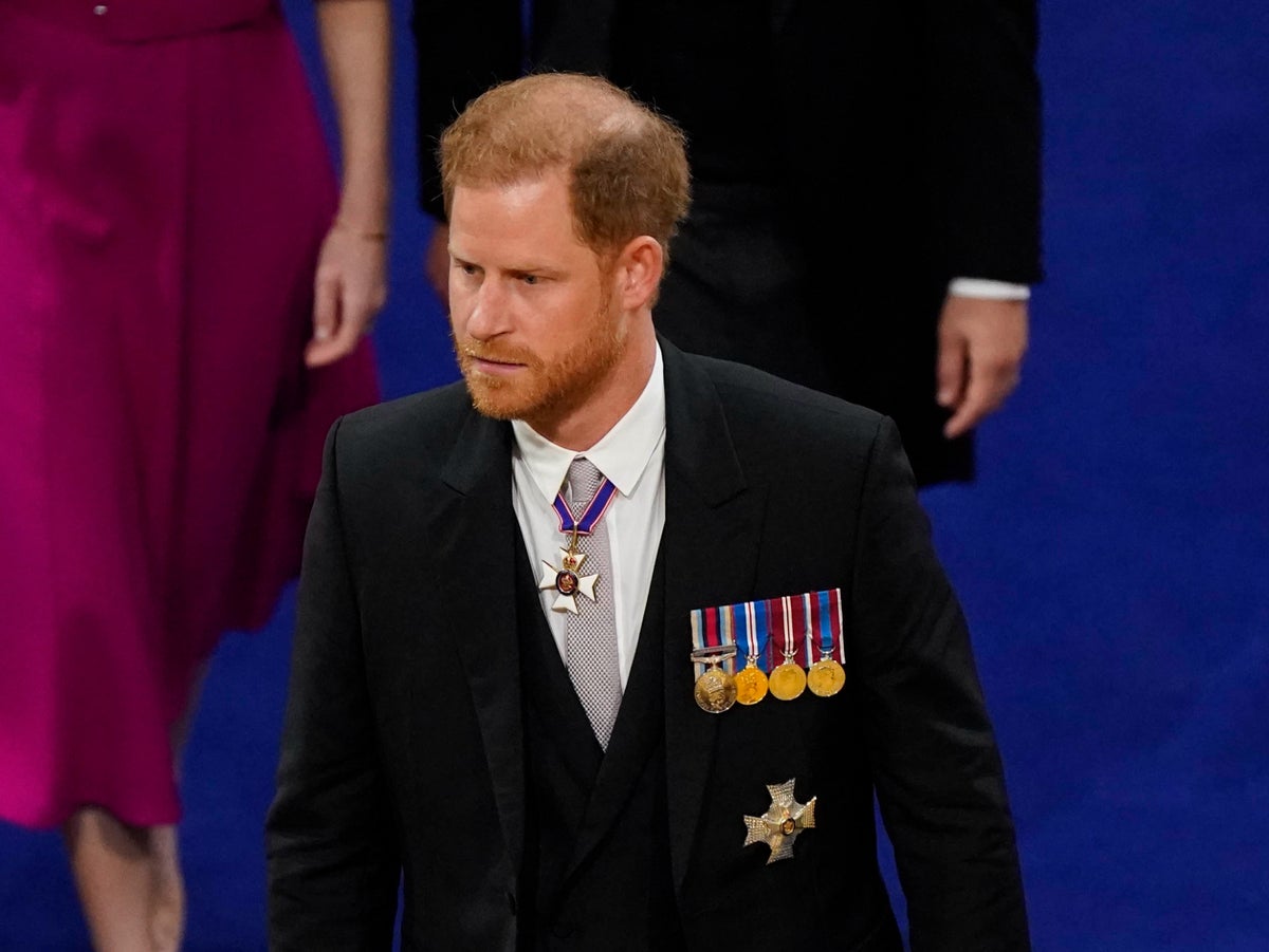 Lone Prince Harry arrives at Westminster Abbey for father’s coronation