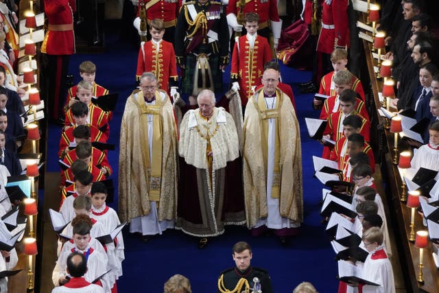 The King arrives for his coronation at Westminster Abbey (Andrew Matthews/PA)