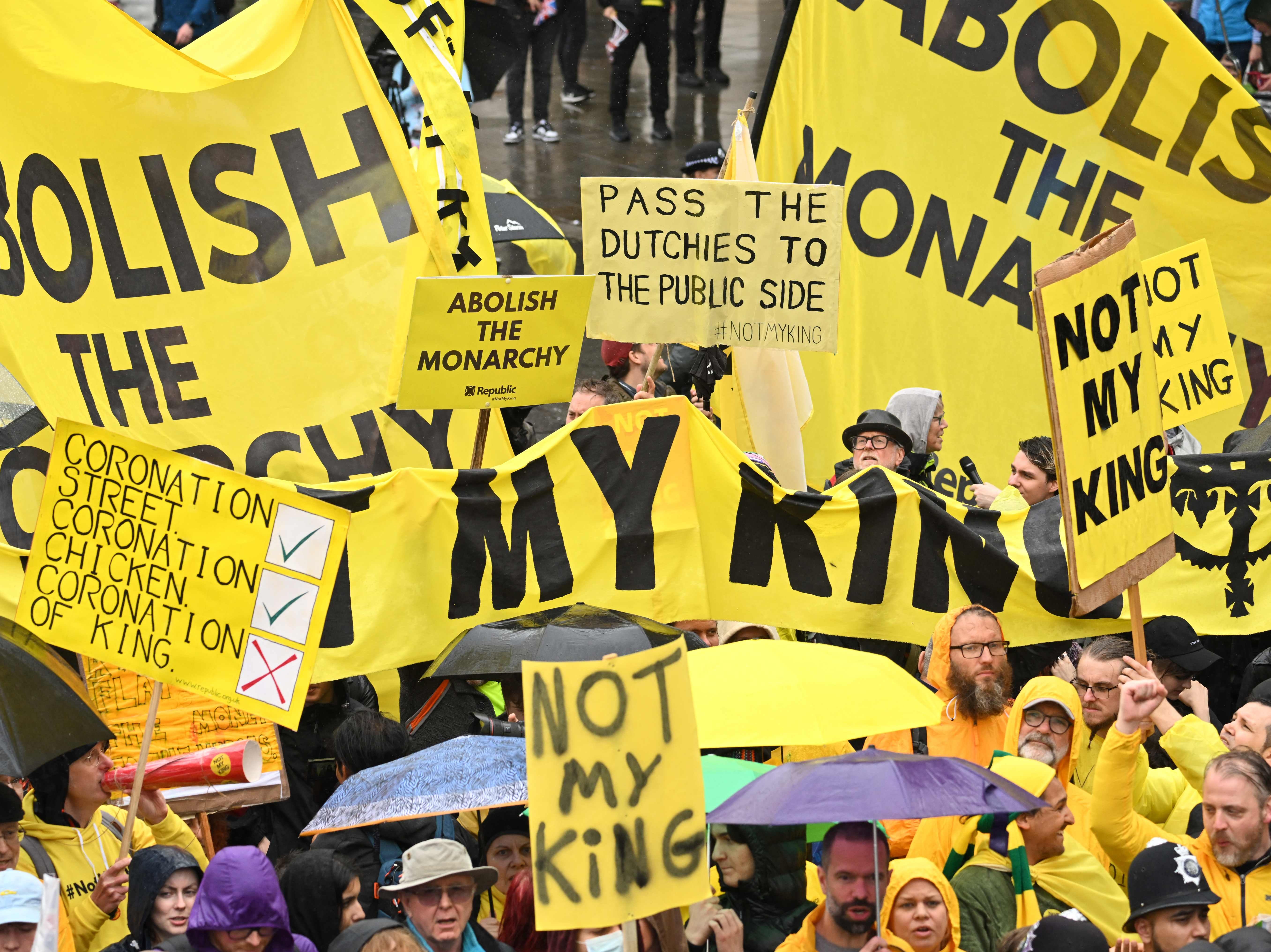 Protesters wave “Not My King” signs near Trafalgar Square ahead of the coronation of King Charles III