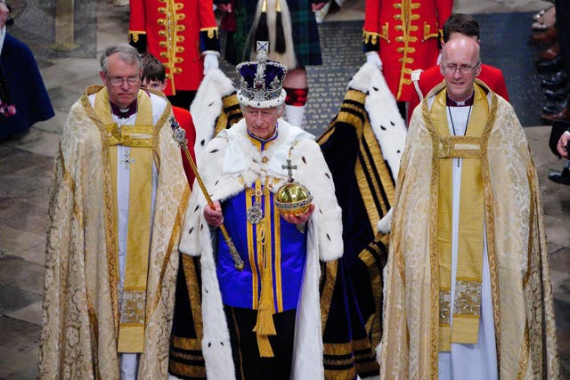 King Charles III, wearing the Imperial State Crown, following his coronation ceremony (Ben Birchall/PA)