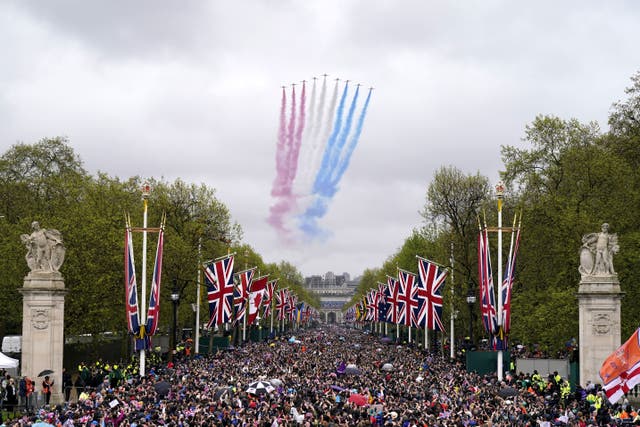 <p>A general view of flypast by aircraft from the Red Arrows over the Mall following the coronation of King Charles III and Queen Camilla in London. Picture date: Saturday May 6, 2023.</p>