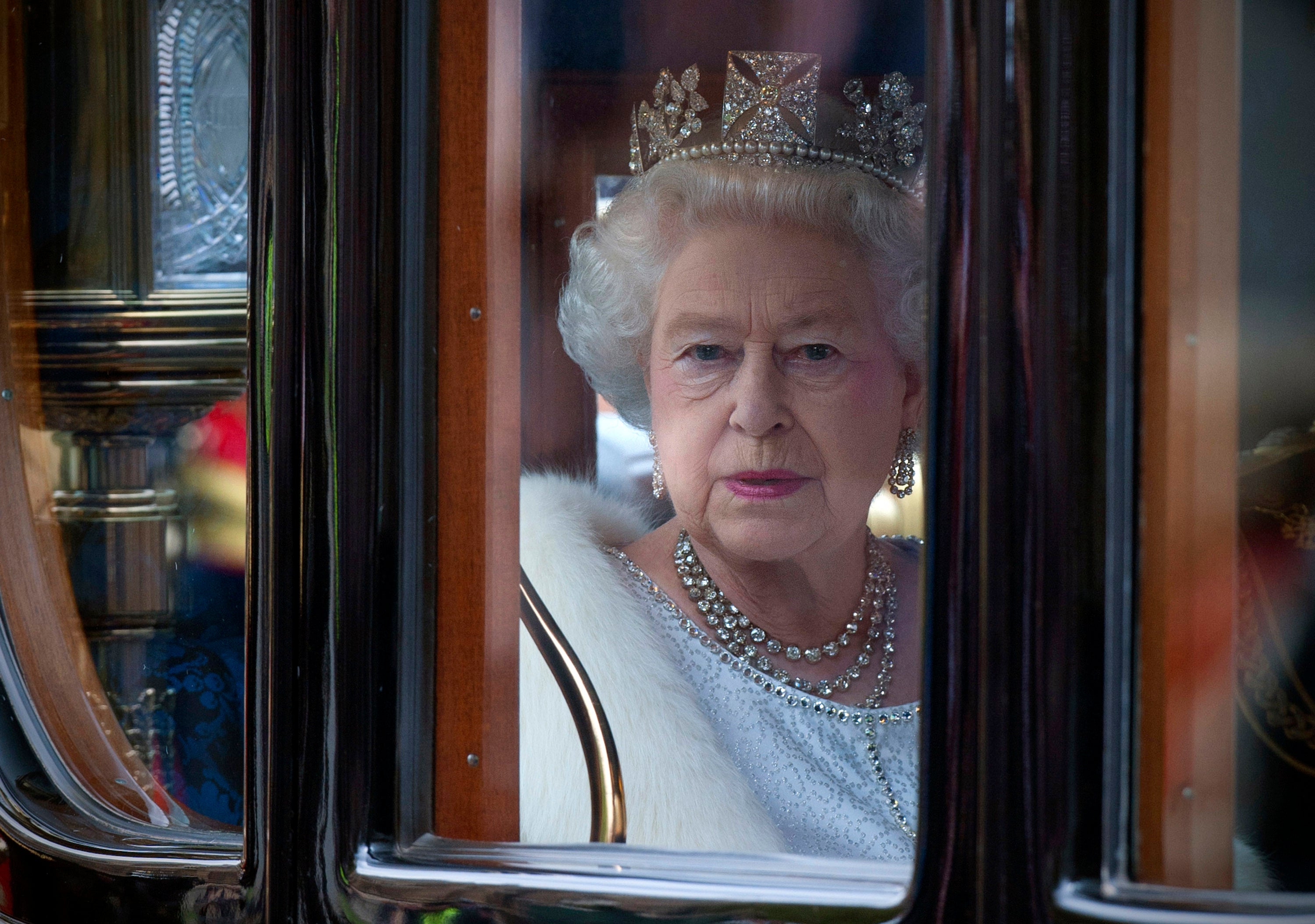 Queen Elizabeth II wears the George VI Festoon Necklace to the State Opening of Parliament on 9 May 2012