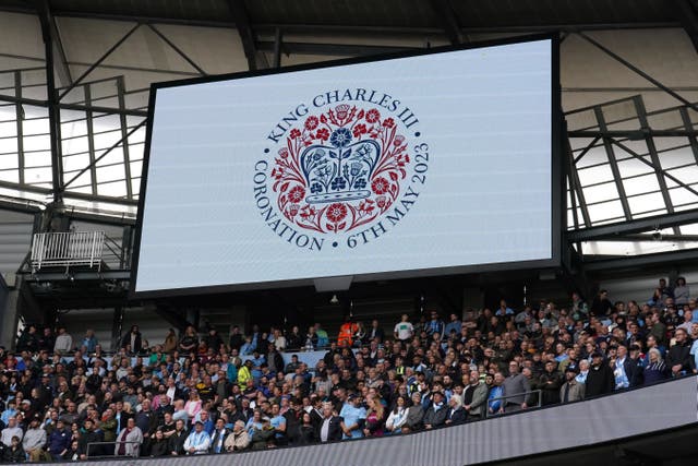 The big screen at Manchester City’s Etihad Stadium showed a symbol relating to the King’s coronation (Martin Rickett/PA)
