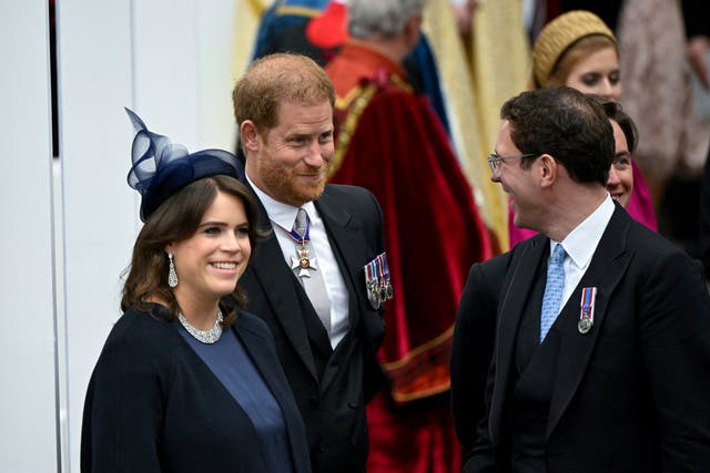 <p>Princess Eugenie and Jack Brooksbank alongside Prince Harry at the coronation of King Charles III and Queen Camilla on 6 May 2023 </p>