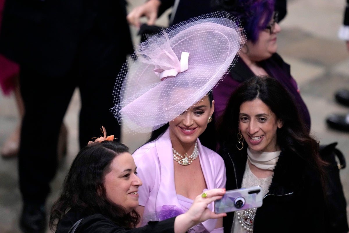 AP PHOTOS: From Charles to Derby, day for fancy hats to rule