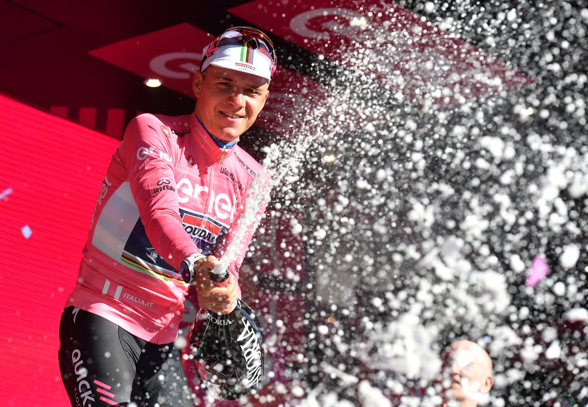 Giro d’Italia: Remco Evenepoel claims pink jersey with superb time-trial victory