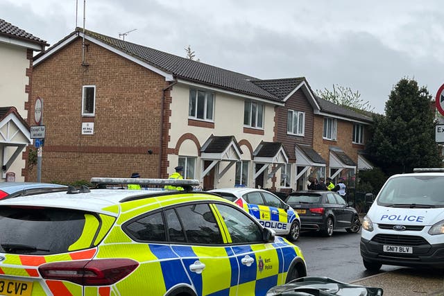 <p>Police officers at the scene in Priory Road, Dartford, Kent, a woman has been rushed to hospital with serious injuries after being held hostage at her home, witnesses have said.</p>