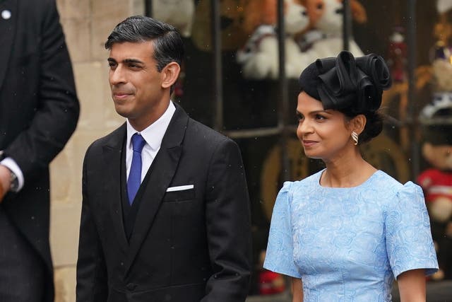 Prime Minister Rishi Sunak and his wife Akshata Murty arriving ahead of the coronation (Jacob King/PA)