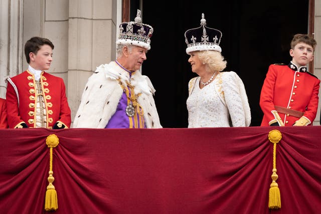 King Charles III and Queen Camilla on the balcony of Buckingham Palace (Stefan Rosseau/PA)