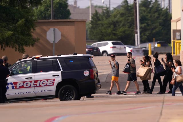 <p>Shoppers raise their hands after shooting at Texas outlet mall </p>