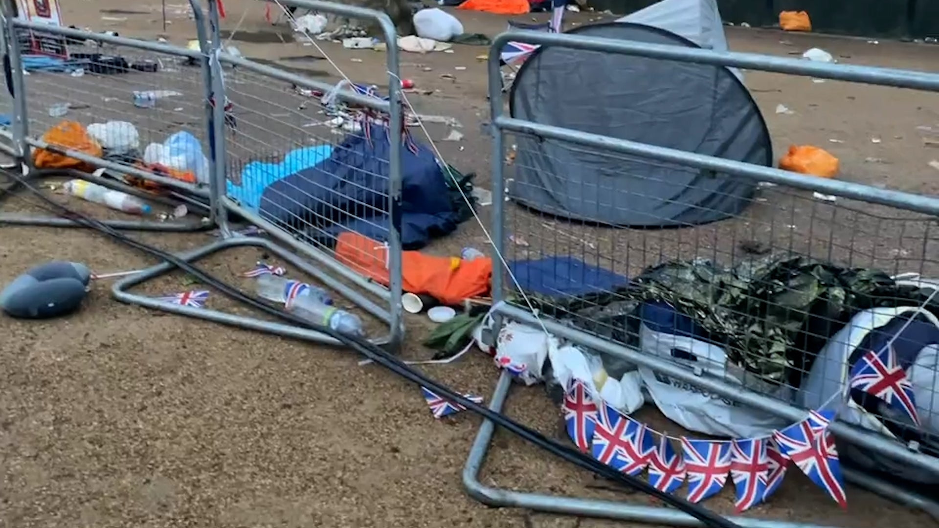 <p>Buckingham Palace Mall littered with tents and union jacks in coronation aftermath</p>