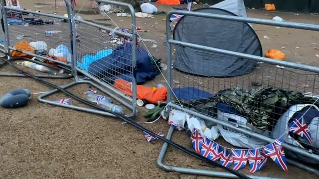 <p>Buckingham Palace Mall littered with tents and union jacks in coronation aftermath</p>