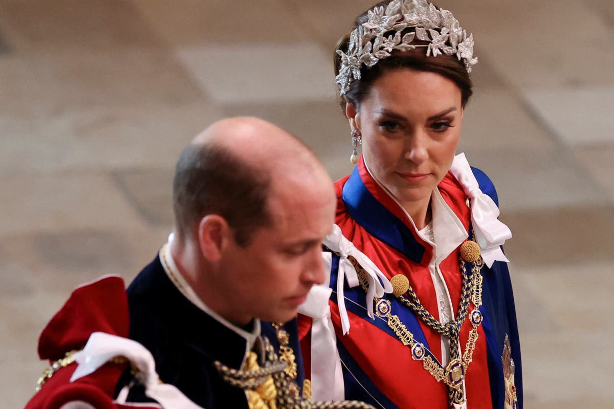 King and Queen give thanks as William and Kate greet well-wishers in Windsor