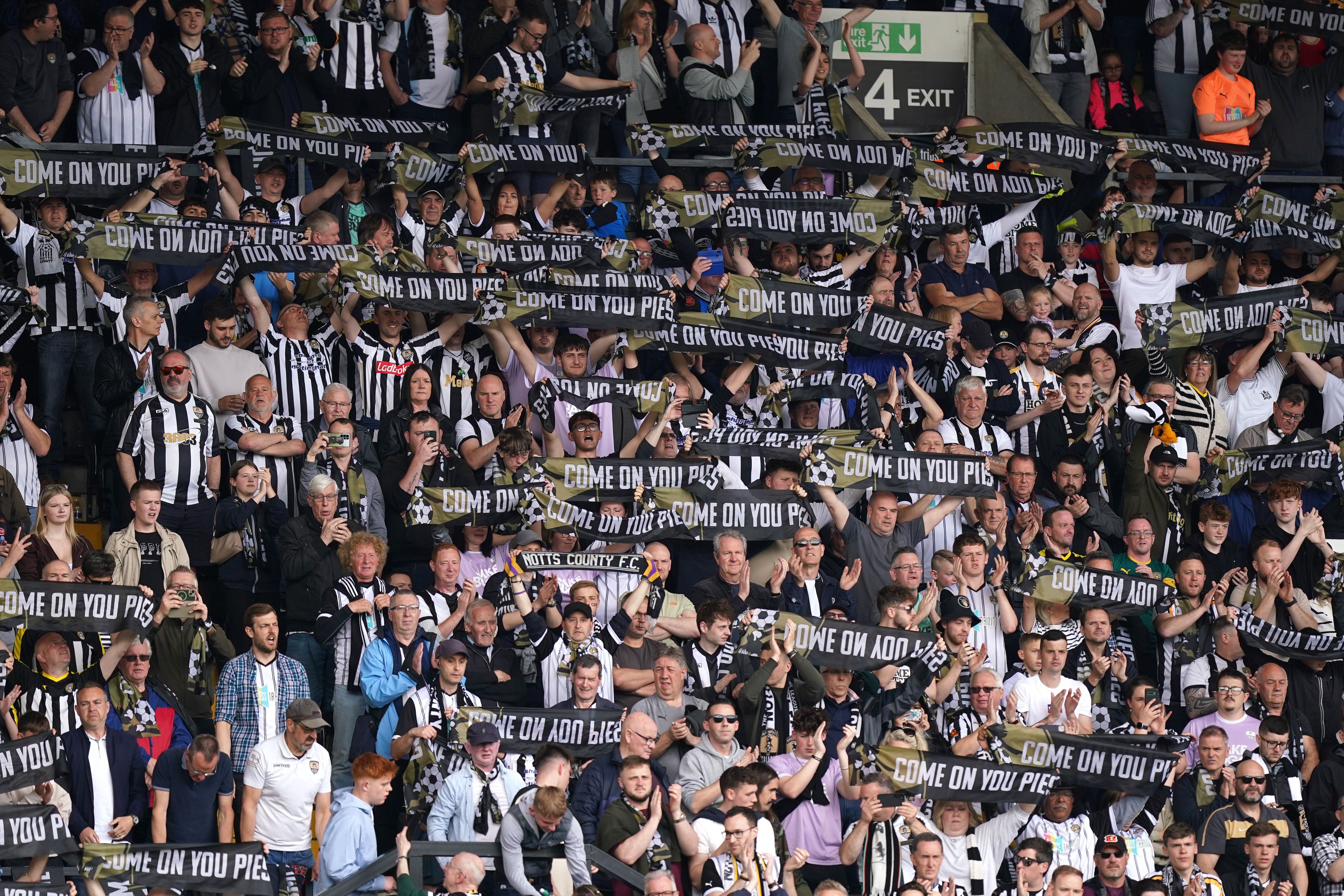 Notts County fans show their support during their 3-2 extra-time National League play-off semi-final win over Boreham Wood (Mike Egerton/PA Images).
