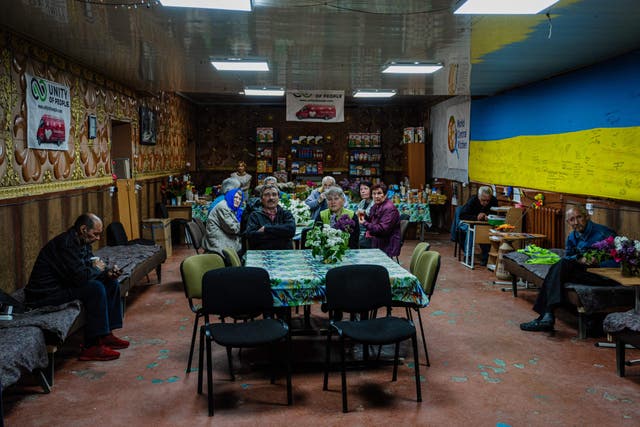 <p>Local residents in Orikhiv, in the Zaporizhzhia region, await news of the Ukraine counter-offensive</p>