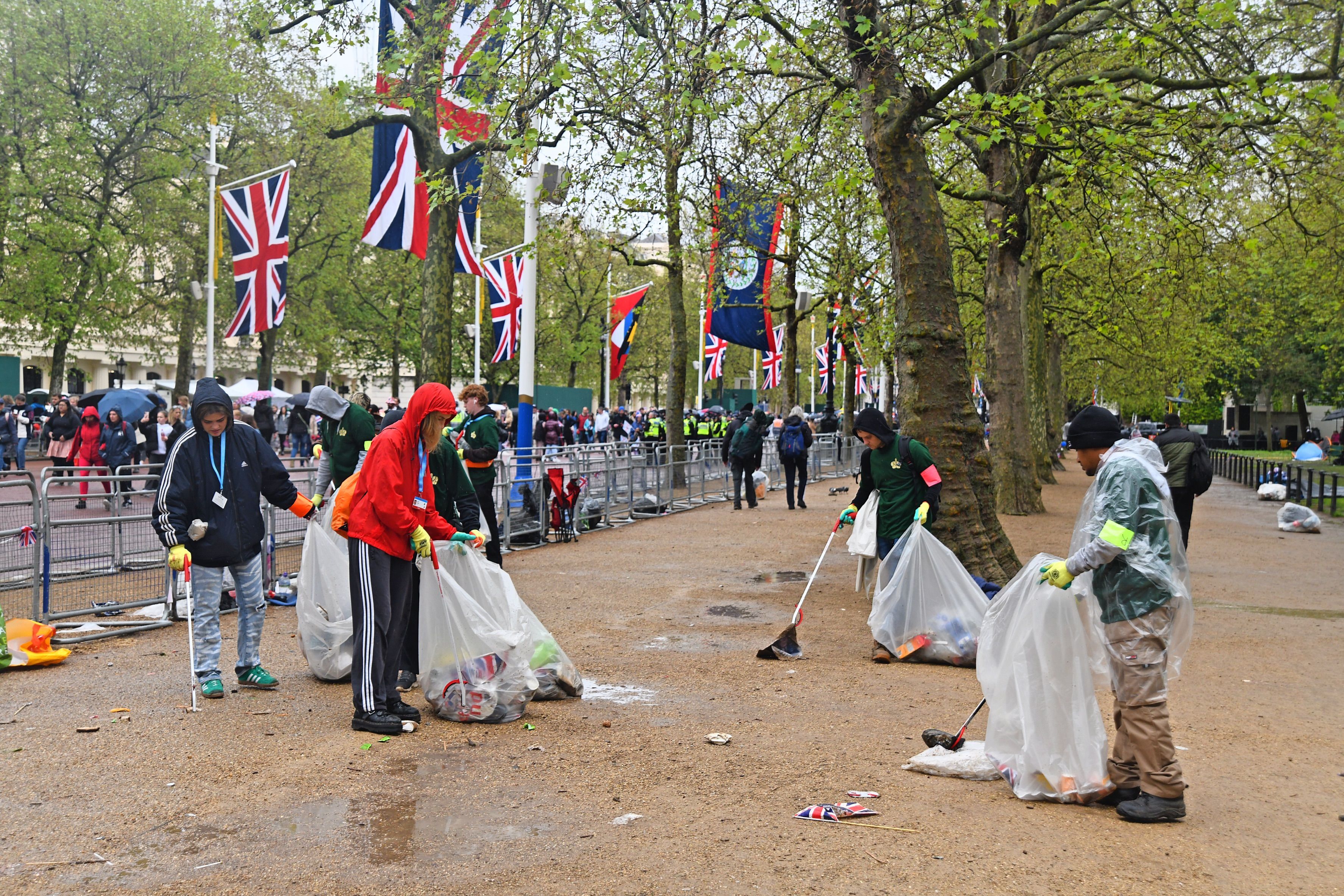 Litter pickers collect rubbish following the coronation day celebrations
