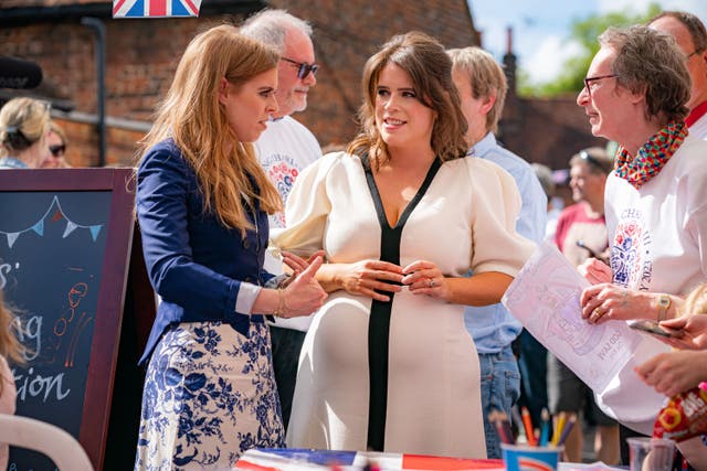 Princess Beatrice (left) and Princess Eugenie attend the Coronation Big Lunch in Chalfont St Giles, Buckinghamshire (Ben Birchall/PA)