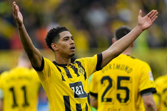 Jude Bellingham scored twice as Borussia Dortmund thrashed Wolfsburg 6-0 (Martin Meissner/AP)