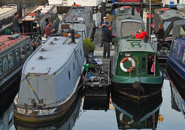 <p>Police officers confronted the suspect in Limehouse, East London </p>