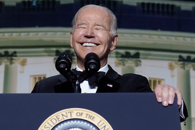 <p>President Joe Biden laughs while delivering an address to the White House Correspondents Association Dinner </p>