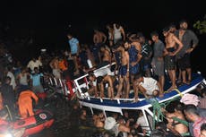 Children among 22 dead after double-decker tourist boat capsizes in India