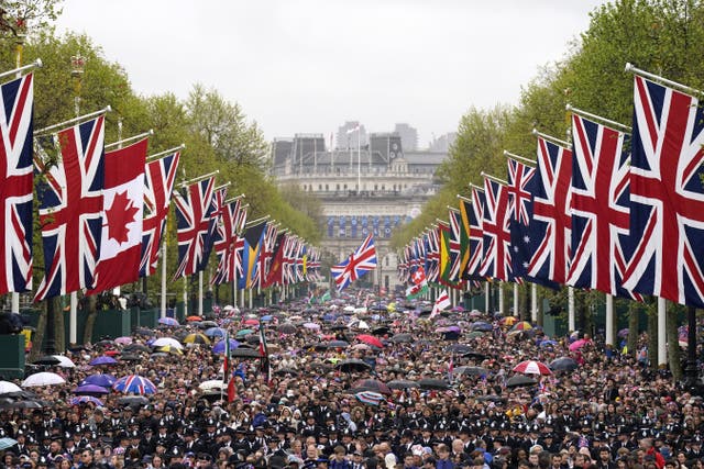 Crowds fill The Mall following the coronation of the King and Queen Camilla (Niall Carson/PA)