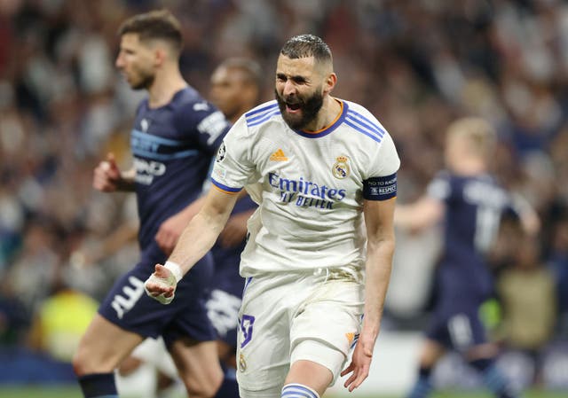<p>Karim Benzema of Real Madrid celebrates after scoring his side's third goal in the Champions League semi-final win over City at the Bernabeu last season</p>