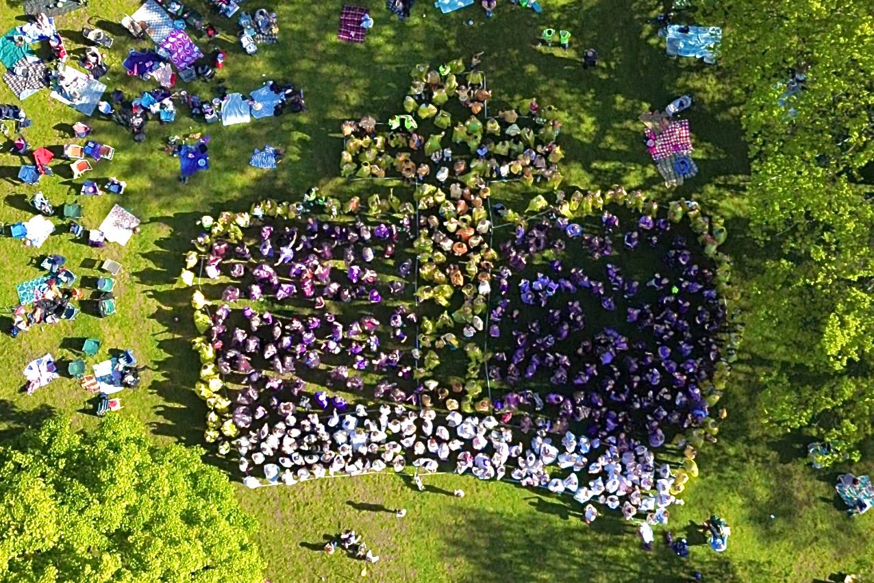 Coronation Big Lunch attendees at Broomhill Common in Orpington form a giant crown (Steve Sangster)