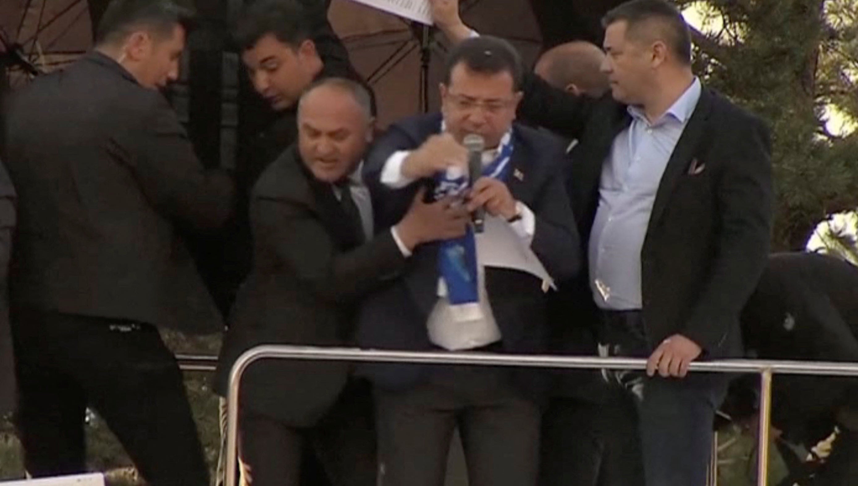 Television cameras capture the moment Istanbul mayor Ekrem Imamoglu of the CHP is pelted with stones in Erzurum, Turkey, on Sunday