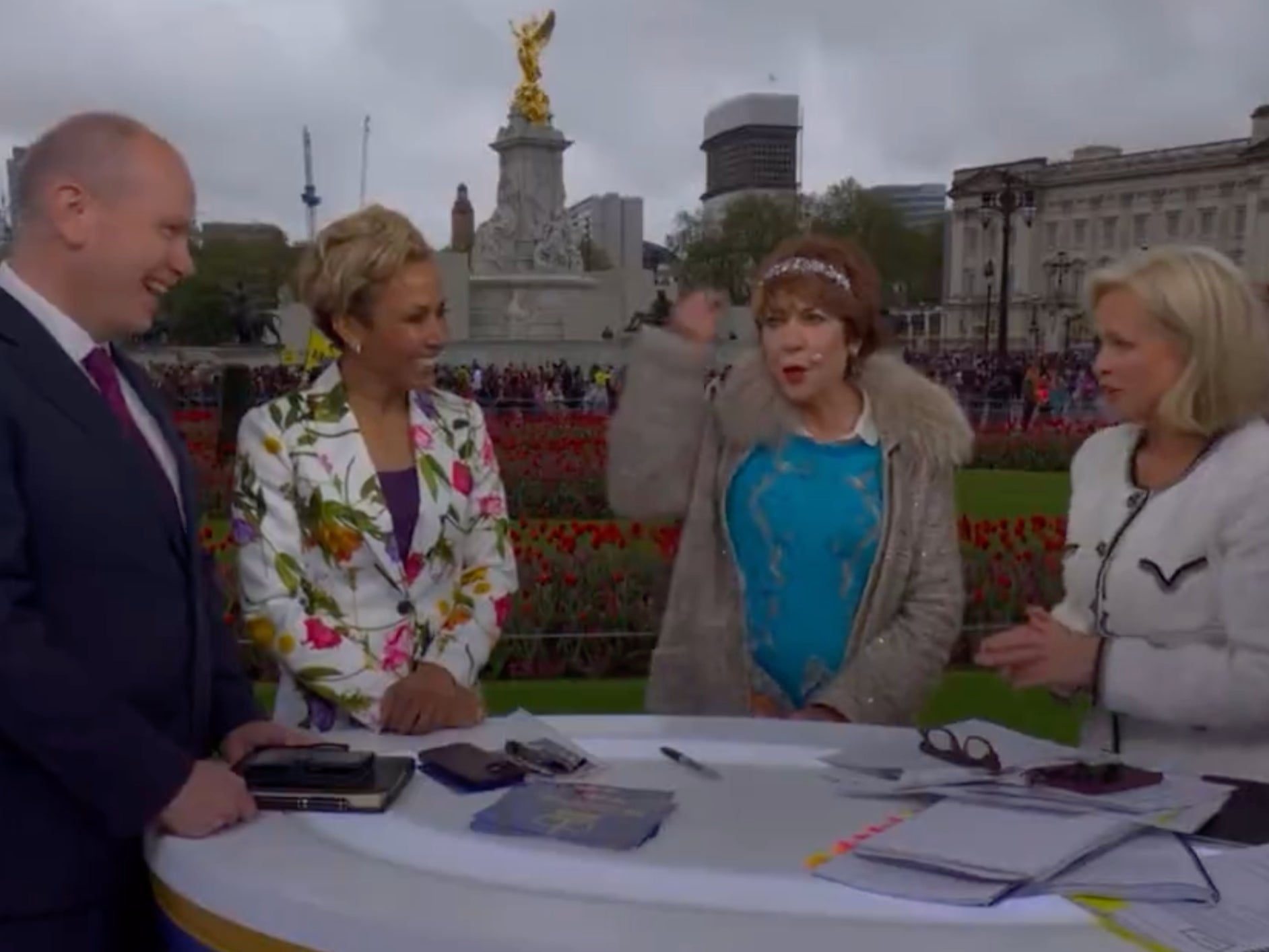 <p>Author Kathy Lette mimes a snorkel when discussion turned to the sinking island nation of Tuvalu, part of the Commonwealth, during Sky News live commentary of King Charles’ coronation </p>