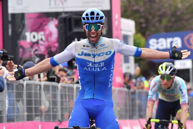 <p>Michael Matthews celebrates as he crosses the finish line to win stage 3</p>