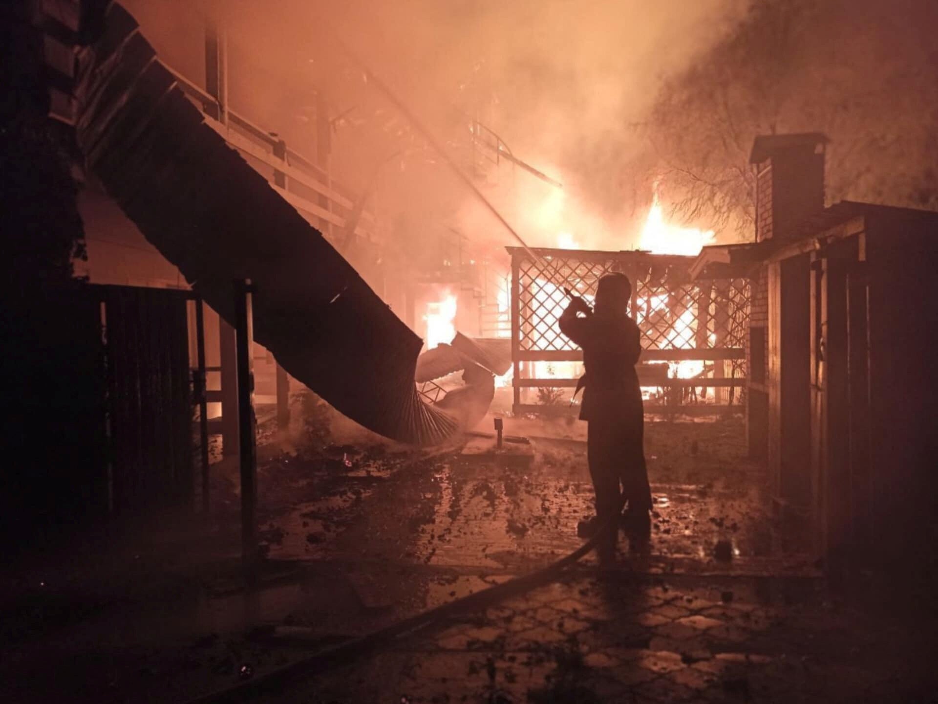 A firefighter at the site of a Russian missile strike in Odesa on Monday