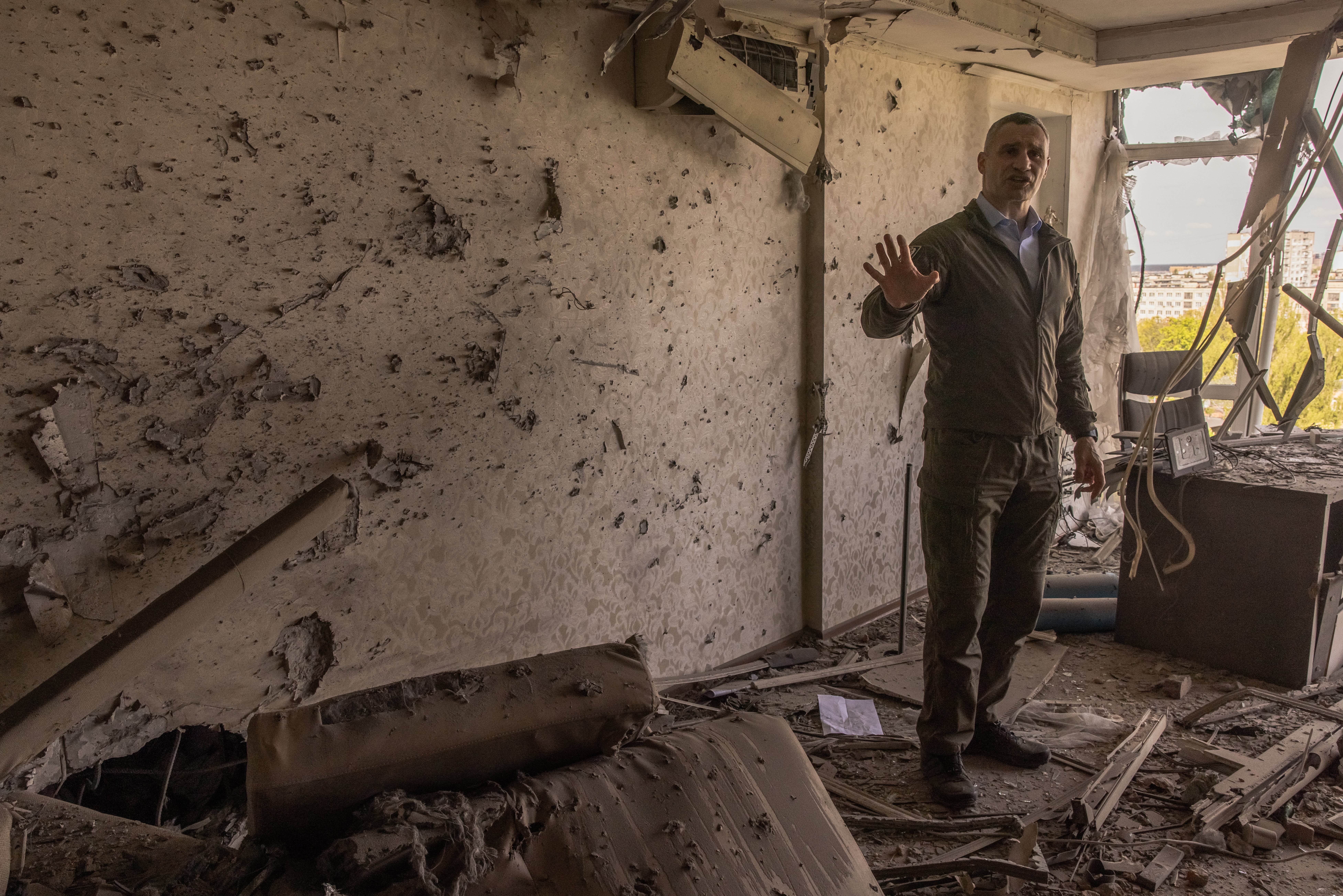 Kyiv mayor Vitali Klitschko visits a home damaged by debris from an intercepted Russian drone