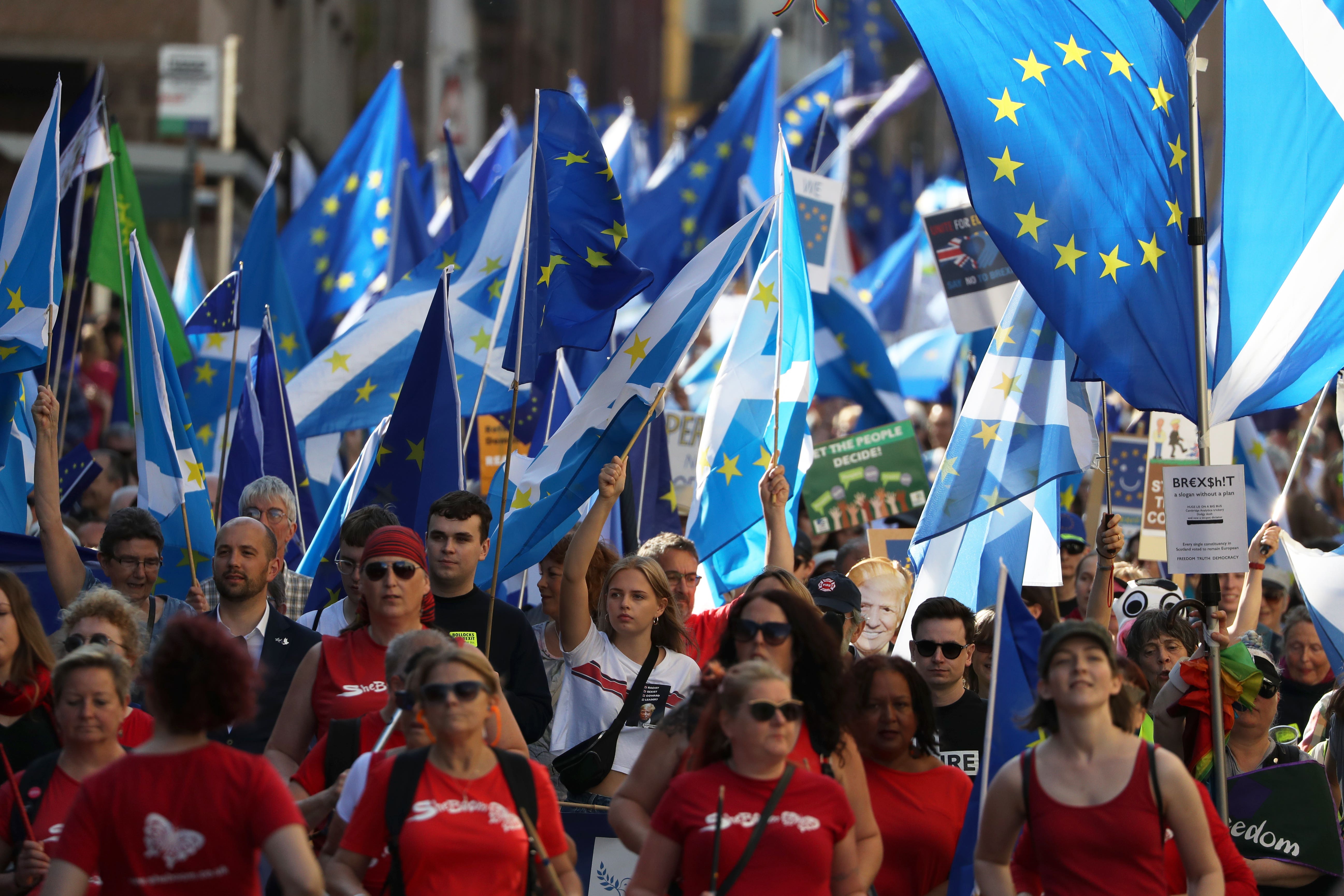 Campaigners at a march calling for the UK to remain in the EU (Andrew Milligan/PA)