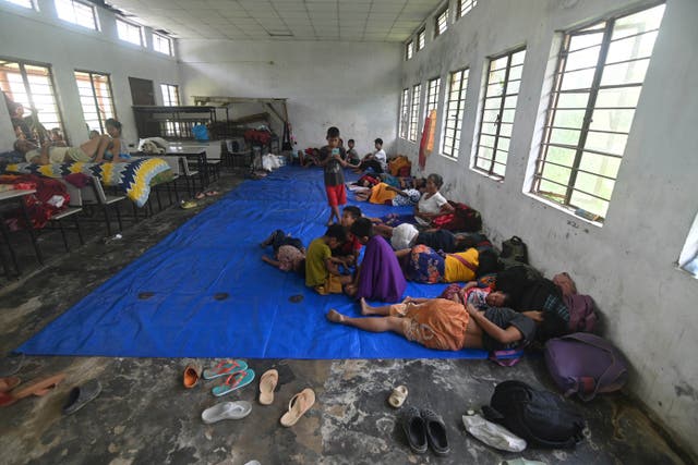 <p>Refugees from Manipur state rest at a relief camp at Lakhipur, in the northeastern Indian state of Assam, Sunday, May 7</p>