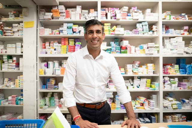 <p>Rishi Sunak during a visit to his family's old business, Bassett Pharmacy, in Southampton</p>