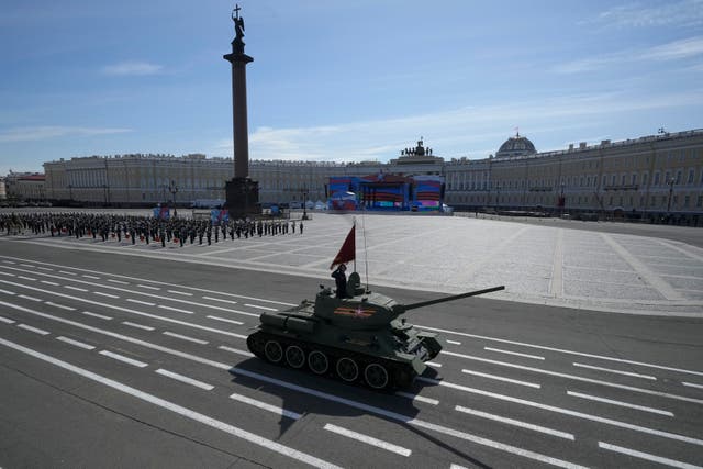 <p>A World War II ages Soviet army T-34 tank rolls during the Victory Day military parade at Dvortsovaya (Palace) Square to celebrate 78 years after the victory in World War II in St. Petersburg, Russia, Tuesday, May 9, 2023. (AP Photo/Dmitri Lovetsky)
</p>
