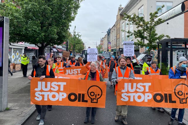 Just Stop Oil protesters take part in a march in Camden Town (Luke O’Reilly/PA)