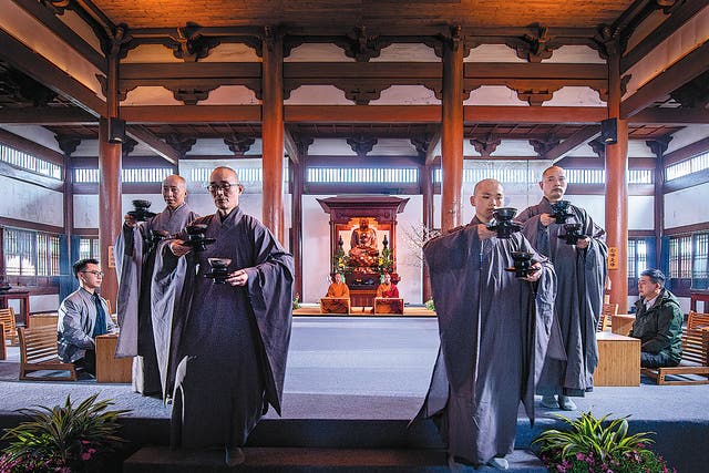 <p>Jingshan Temple in Hangzhou, Zhejiang province, plays host to regular ceremonies to help visitors understand traditional tea culture </p>