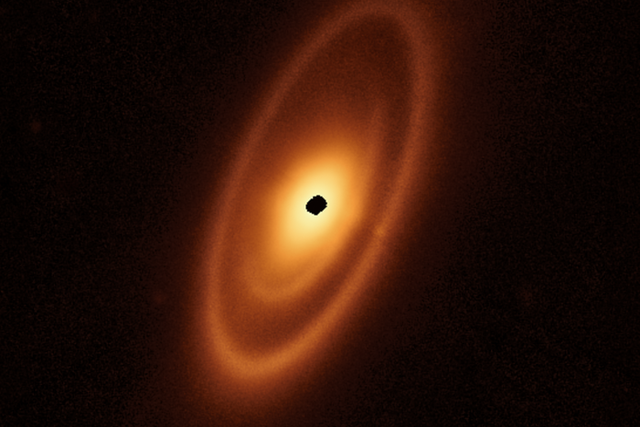 <p>This image of the dusty debris disk surrounding the young star Fomalhaut is from Webb’s Mid-Infrared Instrument (MIRI). It reveals three nested belts extending out to 14 billion miles (23 billion kilometers) from the star. The inner belts – which had never been seen before – were revealed by Webb for the first time</p>