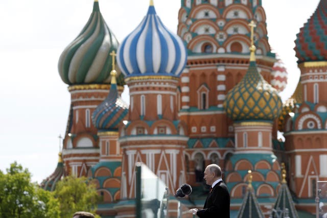 <p>Putin delivers his Victory Day speech, with St Basil’s Cathedral in the background</p>