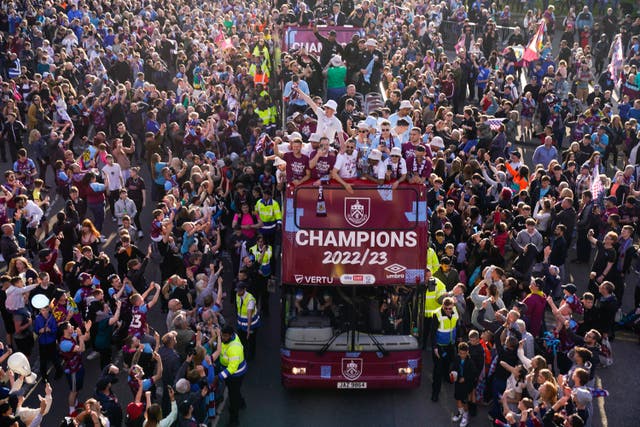 Burnley’s players paraded the Championship trophy through the town on Tuesday night (Danny Lawson/PA)