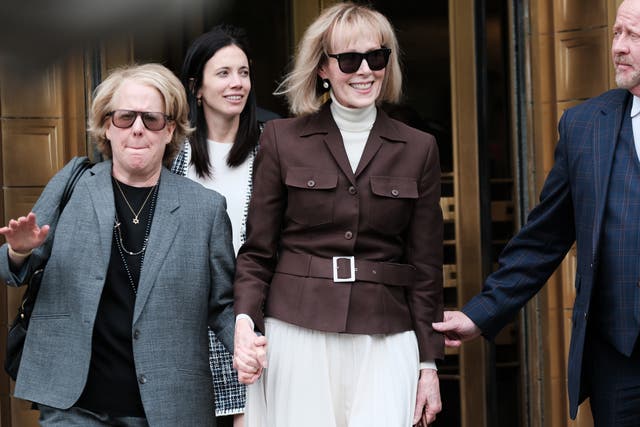 <p>E Jean Carroll (center) leaves a Manhattan courthouse after a jury found Donald Trump liable for sexually abusing her in a Manhattan department store in the 1990s on 9 May 2023 in New York City</p>
