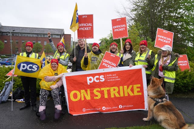 PCS union members at HMRC on a picket line outside the East Kilbride offices (Andrew Milligan/PA)
