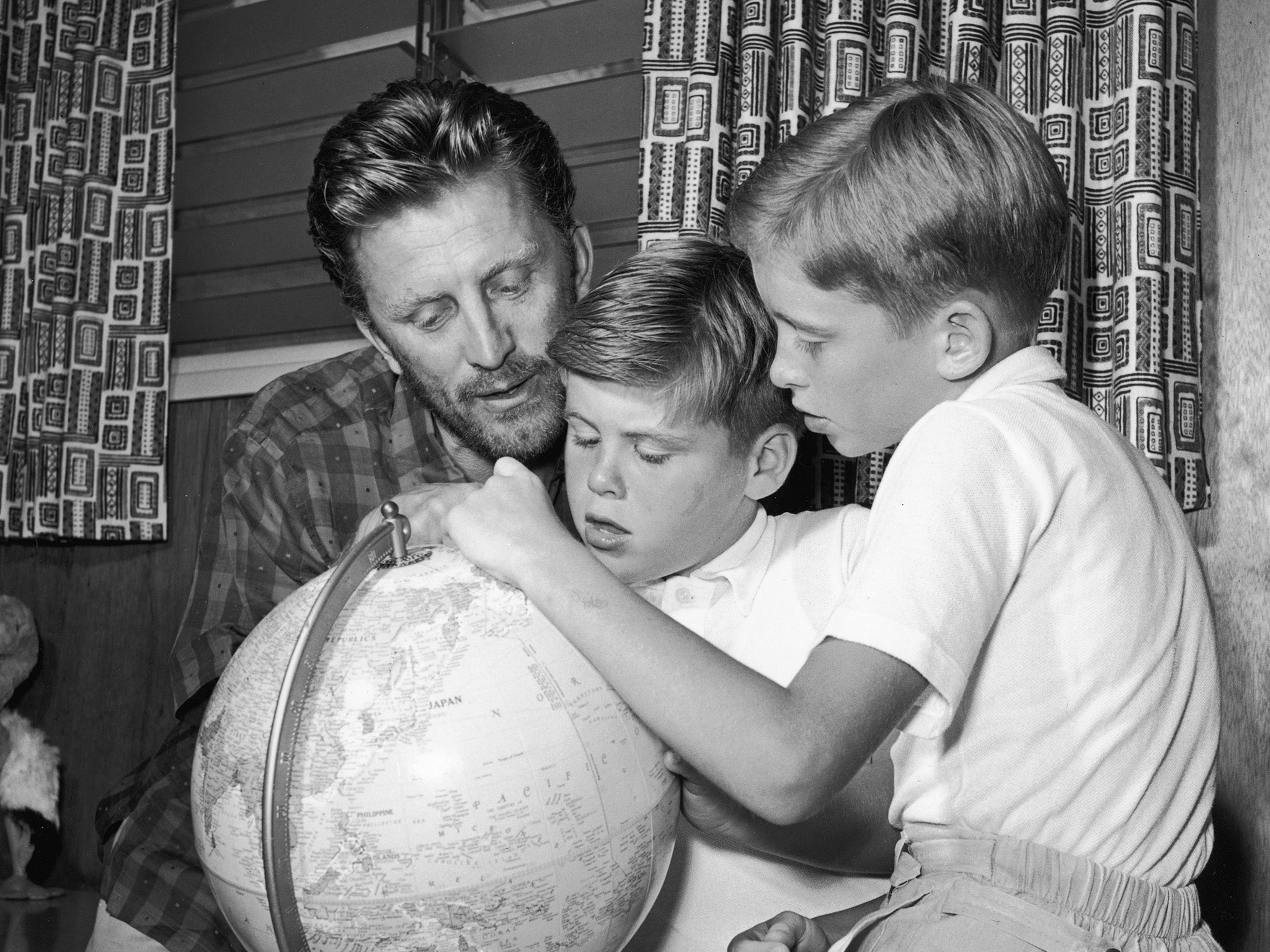 Kirk Douglas with two of his young sons, Joel and Michael, in 1956