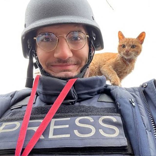 <p>Arman Soldin snaps a selfie with a cat during an assignment for AFP in Ukraine. He was killed by rocket strike.</p>
