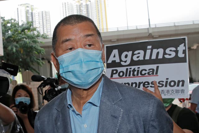 <p>Jimmy Lai, among various of groups of pro-democracy activists, arrives at a court in Hong Kong on 15 September 2020</p>